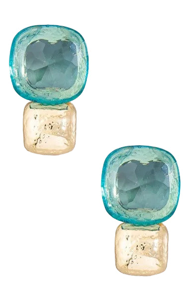 Pair of earrings with blue and gold square designs on a light gray background